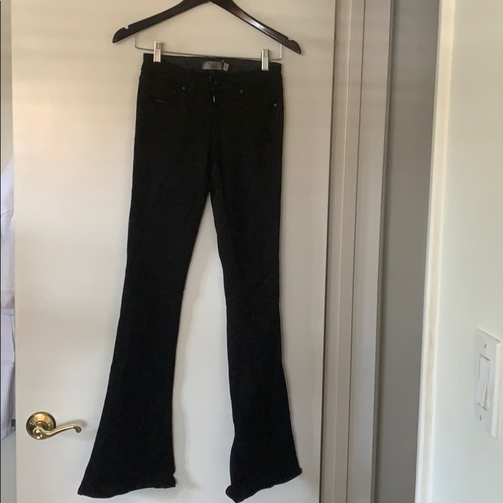 Black denim jeans. Slight flare